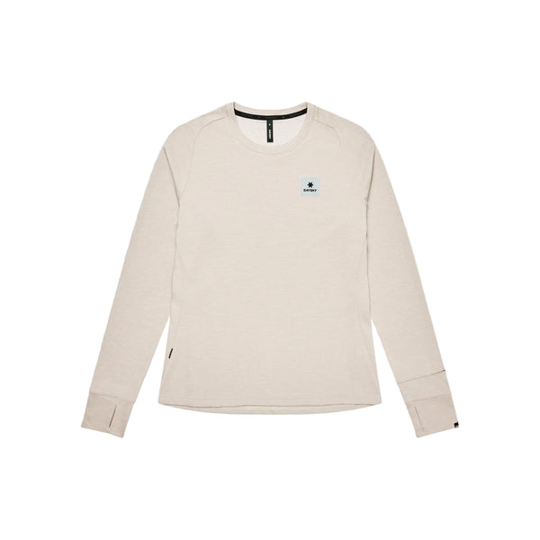 Beige, svedtransporterende Saysky Clean Flow langærmet trøje, dame, beige sportstrøje med tommelfingerhuller og et lille logo-mærke på brystet.