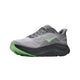 En Hoka Clifton 11, herresko i farvekombinationen Galactic Grey / Stardust, med maksimal støddæmpning, en tyk sort og grøn sål samt et overmateriale, der ligner mesh, ses set fra siden på en hvid baggrund.