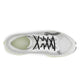 Et topbillede af On Cloudmonster 3 Hyper herre løbesko i Ivory/Linen viser lysegrønne detaljer, sorte snørebånd, en overdel i mesh og ON-logoet på indersålen. Denne herresneaker har maksimal dæmpning og ser ny og ubrugt ud.