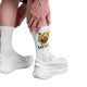 En person i hvide sportssko og Saysky's Combat High Socks, Unisex, White "Tiger Grind" bøjer sig ned og rører ved sine ben, hvilket fremhæver præstationskomforten mod en almindelig hvid baggrund.