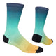 Saysky Drip Dye Combat Socks 200, Unisex, Blue Aop er strømper i rundkredslængde med et gradientdesign fra mørkeblå ved manchetterne til turkis i midten og gul ved tæerne med sorte hæle og tåkapper.