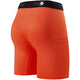 Bagfra-billede af Stance Compression Nylon-undertøj til mænd i farven Tomato, der viser en sort elastisk linning med »Stance«-logoet og en lille lomme på højre ben. Fremstillet af højtydende nylon. Vist på en ensfarvet hvid baggrund.