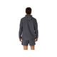 En person står med ryggen til kameraet, iført en mørkegrå Asics Core Jacket, Herre, i farven Carrier Grey samt matchende shorts. Denne vandafvisende jakke fra Asics er ideel som en løbejakke til mænd for dem, der ønsker både stil og funktionalitet. Baggrunden er ensfarvet hvid.