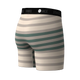 Her præsenterer vi Double Stripe Wholester til mænd fra Stance, med vandrette grønne og beige striber (Croissant) og en sort linning med STANCE-logoet i hvidt. Disse boxershorts er fremstillet af det ultrabløde Butter Blend-materiale og kombinerer komfort hele dagen med et stilfuldt design.