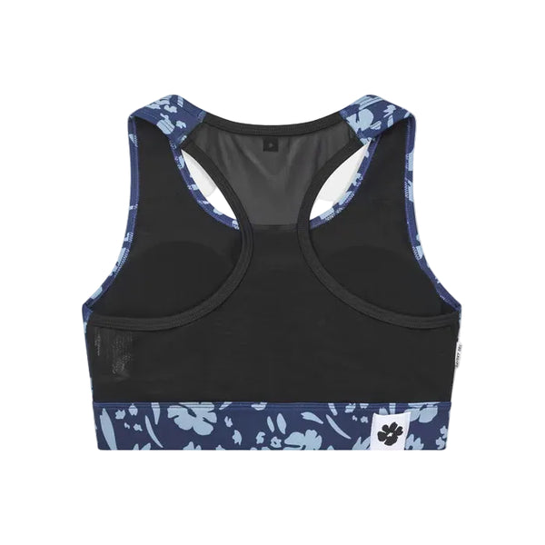 Bagsiden af Saysky Flower Combat Sports Bra, Dame, Blue Flower med blå blomsterkant på stropper og forneden. Ideel som åndbar sports-bh til højintensivt løb. Har et hvidt mærke med et sort logo med poteprint nederst i venstre side.