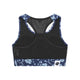 Bagsiden af Saysky Flower Combat Sports Bra, Dame, Blue Flower med blå blomsterkant på stropper og forneden. Ideel som åndbar sports-bh til højintensivt løb. Har et hvidt mærke med et sort logo med poteprint nederst i venstre side.