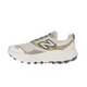 New Balance Freshfoam Hierro V9, Dame, Angora er en hvid og grå trailløbesko med en tyk sål, sort N-logo, guldfarvede detaljer og sort slidbane. Den vises på en almindelig hvid baggrund.
