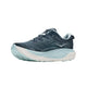 Hoka Gaviota 6-løbesko til kvinder i farven Faded Navy/Glimmering Blue har en tyk, lyseblå og hvid sål, en overdel i åndbart mesh og et diskret logo på siden, fotograferet på en ensfarvet hvid baggrund.