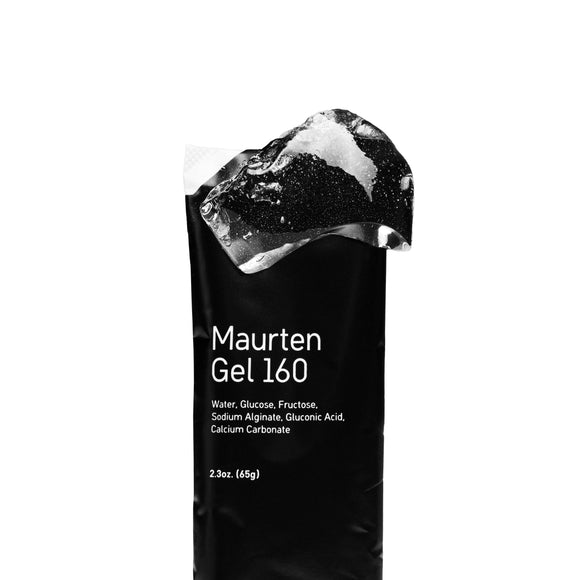 En sort pakke mærket Maurten Gel 160, Neutral - en energihydrogel med et rent, minimalistisk design og en vægt på 65 g (2,3 oz). Ingredienserne er anført nedenfor, og den indeholder en gennemsigtig gel.