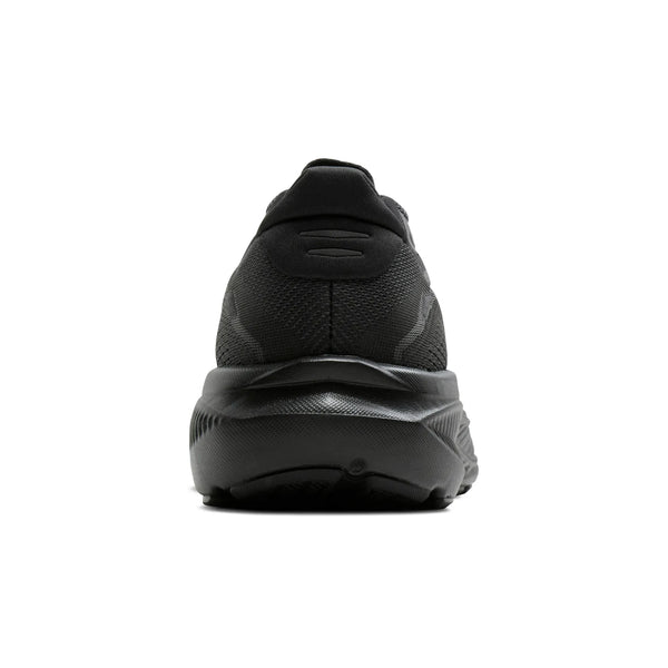Et bagfra-billede af Brooks Ghost 18-løbesko til kvinder i farvekombinationen Black/Black/Ebony, der viser en tyk, struktureret sål med fremragende støddæmpning og en lav hælkrage, fotograferet på en hvid baggrund.