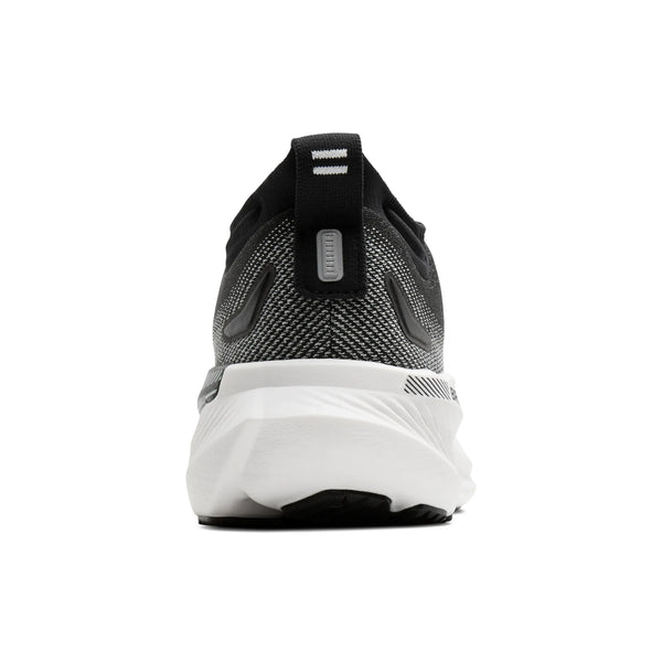 Bagfra-billede af en Brooks Glycerin GTS 23, løbesko til kvinder i sort/grå/hvid, med struktureret overdel, trækflap og tyk, formstøbt hvid sål. Vist på en ensfarvet hvid baggrund – perfekt som mængdetræningssko til kvinder.
