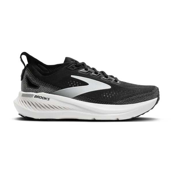 En sort herre-løbesko i sportstil med hvide og grå detaljer, udstyret med en tyk hvid sål, overdel i mesh og Brooks-logoet på siden. Denne Glycerin GTS 23 Herre (Sort/Grå/Hvid), der vises på en ensfarvet hvid baggrund, er en fremragende træningssko til de daglige løbeture.