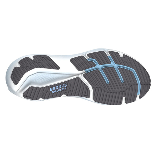 Billedet viser sålen på Brooks Glycerin GTS 23, Herre, White/Rain/Baltic Sea. Den har en sortmønstret ydersål, der giver et godt greb, hvide kanter på mellemsålen, lyseblå detaljer, GuideRails-stabilitet og et synligt Brooks-logo.