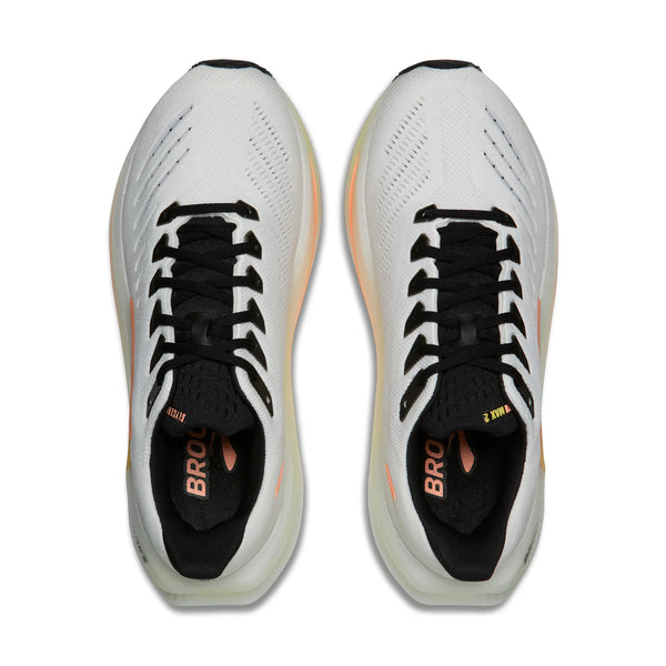Topbillede af Brooks Glycerin Max 2, Dame, i White/Cyber Yellow/Nightlife med sorte snørebånd og foring samt diskrete cybergule detaljer - skabt til maksimal komfort. Brooks-logoet vises delvist på hver pløs.