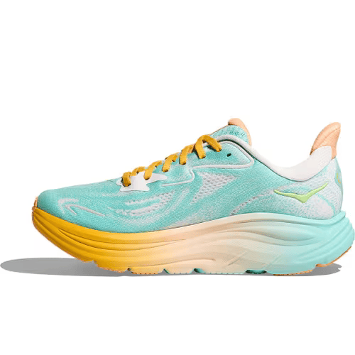 Hoka Clifton 10 Dame i Blue Spark/White har turkis overdel, gule snørebånd, et hvidt logo og en tyk sål med gradient fra gul til turkis - perfekt til neutral pronation og daglig træning, vist på en skarp hvid baggrund.