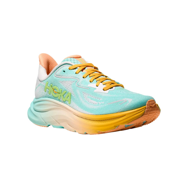A Hoka Clifton 10 herre løbesko i farven Blue Spark/White med gule og orange detaljer, tyk letvægtskomfort-sål, Hoka-logo på siden og gule snørebånd, fotograferet på hvid baggrund.