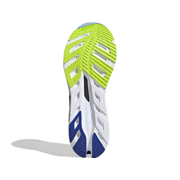 Billedet viser sålen på Adidas Adistar Byd løbesko herre i Blufus/Legink/Sslime med en lysende gulgrøn, hvid og blå slidbane. Det er taget nedefra og fremhæver det strukturerede design, som giver optimal energireturnering og komfort.
