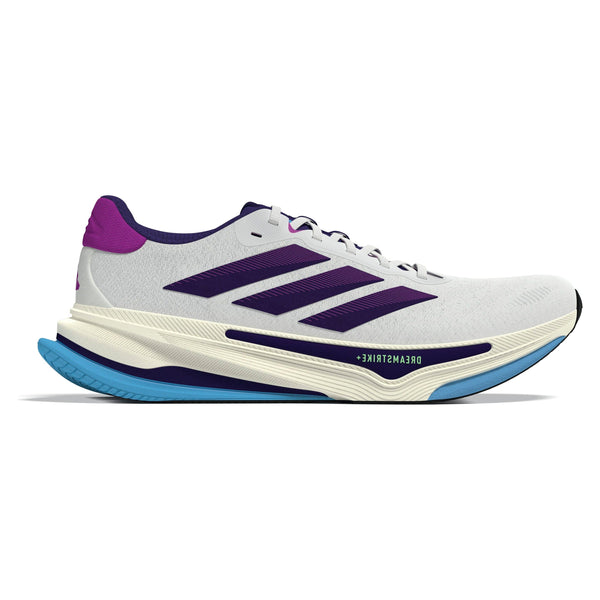 Adidas Supernova Prima 2 Dame løbesko i Cwhite/Cpurpl/Seblbu er hvid med lilla og navy accenter, tre diagonale striber, en tyk cremefarvet sål med blå slidbane for stabilitet og DREAMSTRIKE-tekst nær sålen.
