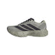 En Sesame/Aurbla/Silpeb Adizero Evo SL-løbesko fra Adidas med et minimalistisk design med sorte striber, sorte snørebånd og en tyk, struktureret sål med et diskret bølgemønster. Med den innovative LIGHTSTRIKE PRO-teknologi er denne sportssko ideel til løb eller til hverdagsbrug.