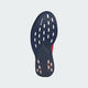 Billedet viser den mørkeblå ydersål på Adidas Adizero Evo SL Woven, Herre (Dkblue/Lucred/Mutprp), med hvide rektangulære greb, et Continental-logo nær toppen, røde accenter og LIGHTSTRIKEPRO-skum langs siden.