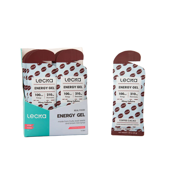 Her ses en æske Lecka Energy Gel Caffeine, Coffee/Cacao med en opretstående pose ved siden af. Hver naturlig energigel indeholder 100 kalorier, 210 mg elektrolytter og 0 mg koffein - perfekt til koffeinfri træning.