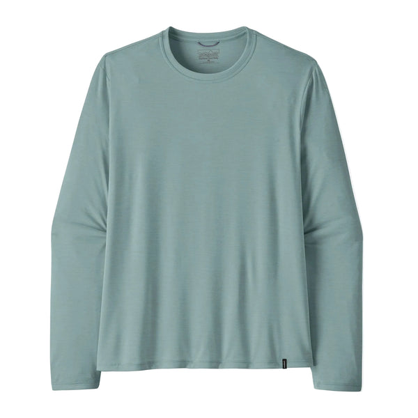 En Patagonia Long-Sleeved Capilene Cool Shirt til mænd i Blue Sage - Light Blue Sage X-Dye er lagt fladt på en hvid baggrund. Skjorten har rund hals og en almindelig front uden synlige mønstre eller logoer.