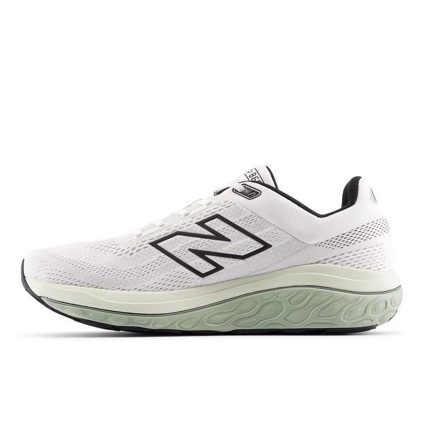 New Balance FreshFoam 860 V14, Herre, Sea er en hvid løbesko med et stort sort N-logo, overdel i mesh og tyk lysegrøn struktureret sål med sort ydersål, set fra siden.