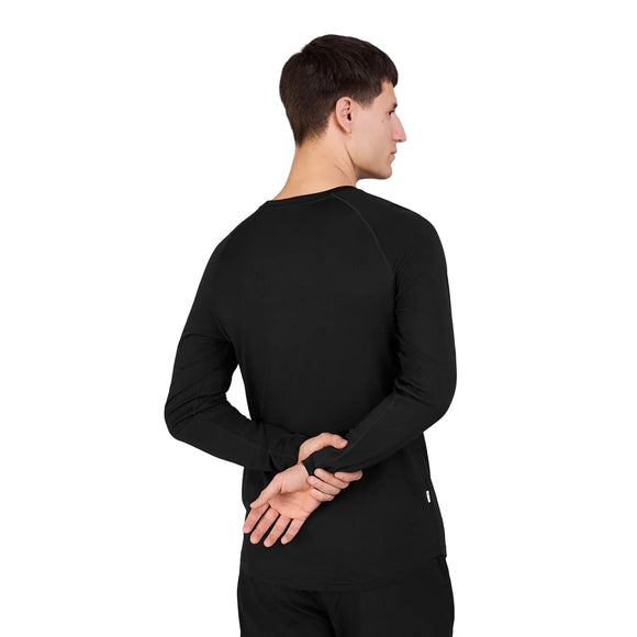 En person set bagfra iført en sort Saysky Merino Base 165 langærmet trøje med raglanærmer.
