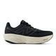 New Balance Freshfoam 1080v14 Dame i sort har et stort N-logo, sorte snørebånd og en tyk off-white Fresh Foam-sål for blød støddæmpning. Skoen er vist i profil mod højre.