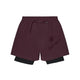 Her præsenterer vi Saysky Pace 2-i-1-shorts 5″ til mænd i farven burgundy. Disse rødbrune løbeshorts har sort inderfor og er prydet med SAYSKY-skriftmærket samt et stjernelogo på venstre ben foran. Den elastiske linning med snøre sikrer justerbar komfort.