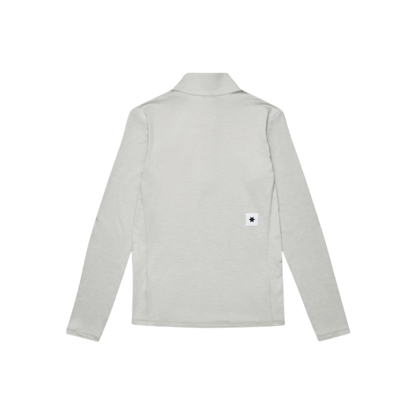 Saysky Pace 1/2 Zip Long Sleeve, Dame, Grey er vist fladt med bagsiden opad. Den har en krave og et lille hvidt rektangulært mærke med et sort symbol nederst i højre side - ideelt til træning eller løb.