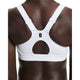 Et nærbillede af en persons ryg iført On Performance Bra, Dame, White, med brede stropper, en oval rygudskæring med et logo over - perfekt til løb og andre aktive aktiviteter.