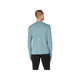 En person står med ryggen til og har en Asics Road Winter Seamless LS Top til mænd i farven »Foggy Teal« på samt sorte bukser. Denne langærmede trøje, der er fremstillet af termomateriale, har en lille hvid prik øverst på ryggen. Baggrunden er ensfarvet hvid.