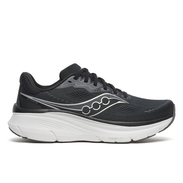 Saucony Guide 19 Herre i sort/sølv har en overdel i mesh, snørelukning og en tyk hvid polstret sål for optimal støddæmpning og stabilitet, vist i sideprofil.
