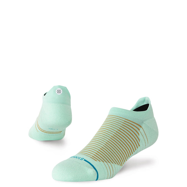 Stance Scanner Light Tab unisex ankelstrømper i mint har beige vandrette striber på toppen og et lille logo på den bageste hæl, vist mod en hvid baggrund.