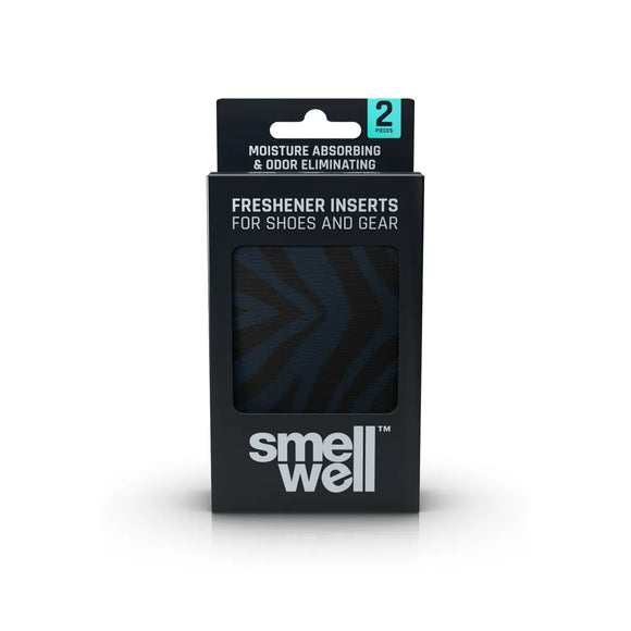 Smellwell Original, Unisex, Black Zebra indeholder to indlæg i en sort æske med Smellwell-branding til sportssko og udstyr. Emballagen har "Moisture Absorbing & Odor Eliminating" og viser aktivt kul mørkt mønstret stof.