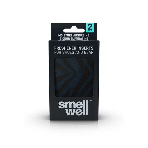 Smellwell Original, Unisex, Black Zebra indeholder to indlæg i en sort æske med Smellwell-branding til sportssko og udstyr. Emballagen har "Moisture Absorbing & Odor Eliminating" og viser aktivt kul mørkt mønstret stof.