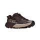 En Hoka Speedgoat 7 GTX-løbesko til mænd i farven Spiced Chocolate / River Rock Grey, med en tyk beige og sort sål med GORE-TEX- og Vibram-logoer, hvide detaljer og et markant Hoka-logo på siden. Denne højtydende trailsko er designet til trail-løb.