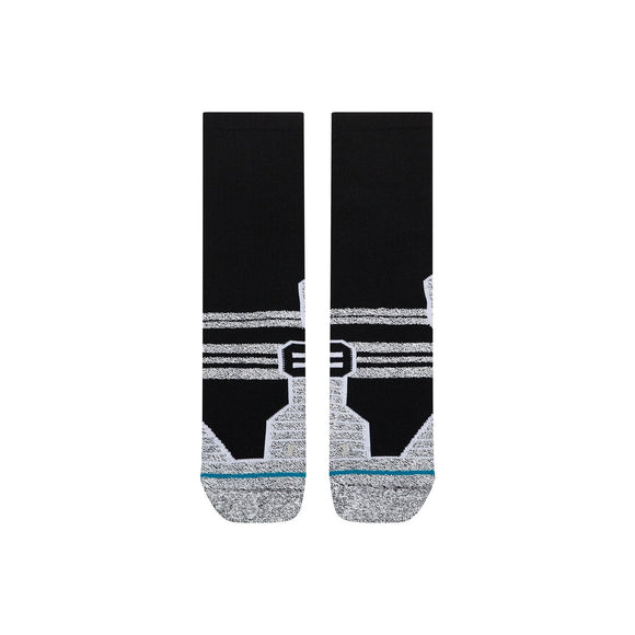 Et par sorte Static Gripper Crew-sokker, unisex, i sort med hvide geometriske mønstre på hælen og midt på foden.