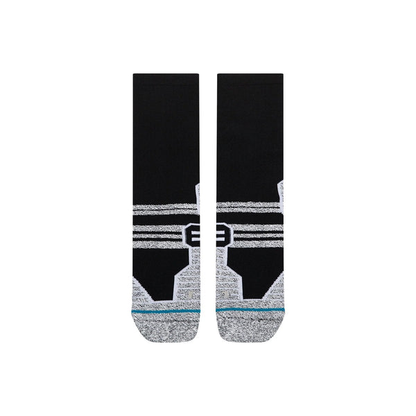 Et par sorte Static Gripper Crew-sokker, unisex, i sort med hvide geometriske mønstre på hælen og midt på foden.