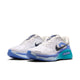 Nike Structure Plus, Dame i White/Midnight Navy-Royal Pulse har blå og lilla detaljer, en sort swoosh og en blå ydersål med tekstur - designet til stabilitet og støtte, hvilket gør dem til ideelle løbesko til overpronation.