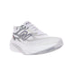 En hvid New Balance Supercomp Rebel V1-løbesko til kvinder i farven Sea Salt med et gråt N-logo på siden, hvide snørebånd, en tyk hvid sål samt diskrete grå og røde detaljer, vist skråt set forfra fra venstre mod en hvid baggrund. Denne lette og responsive FuelCell-sko er designet til at levere både komfort og ydeevne.