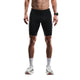En mand bærer Fusion TEMPO! Run Tights i sort unisex, stylet med hvide sokker, hvide sneakers og et armbåndsur. Billedet (skuldre til fødder) på en almindelig hvid baggrund fremhæver det slanke design af disse tights.