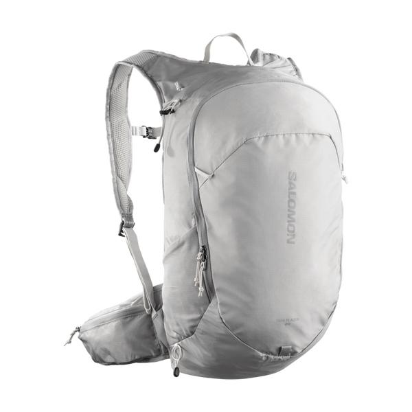 Salomon Trailblazer 20, unisex i farvekombinationen Cloudburst/Paloma/Silver, har flere rum med lynlås, justerbare skulderremme og en taljerem – perfekt til løbependling – vist på en ensfarvet hvid baggrund.