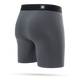 Stance Turbulence Wholester-boxershorts til mænd har et gråt design med en sort elastisk linning og et lille hvidt logo centreret på bagsiden. Billedet viser det behagelige Butter Blend-stof set bagfra på en ensfarvet hvid baggrund.