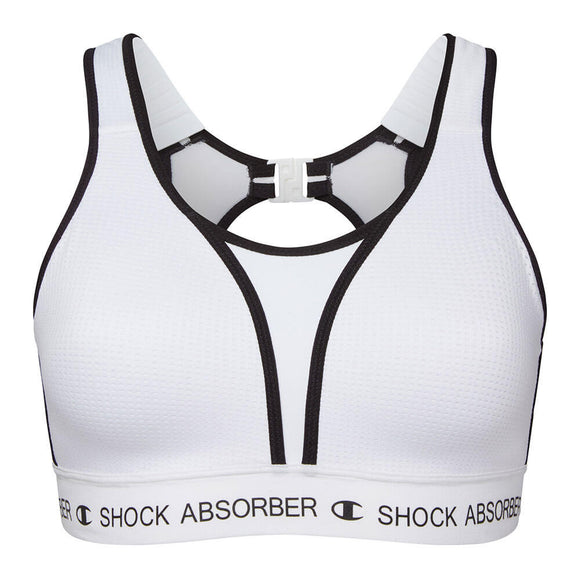 Shock Absorber Ultimate Run Bra Padded, Dame, White har sort kant, racerback-stropper, udskæring foran, lås på ryggen og logoer. Lavet af svedtransporterende materialer for maksimal støtte under aktiviteter med høj belastning.