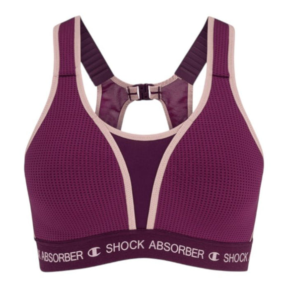 Shock Absorber Ultimate Run Bra Padded til kvinder i violet har beige kantbånd, brede skulderstropper, et frontpanel i mesh, lukning bagpå samt et karakteristisk Shock Absorber-logo på det støttende elastikbånd nederst, der sikrer maksimal støtte.