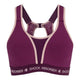 Shock Absorber Ultimate Run Bra Padded til kvinder i violet har beige kantbånd, brede skulderstropper, et frontpanel i mesh, lukning bagpå samt et karakteristisk Shock Absorber-logo på det støttende elastikbånd nederst, der sikrer maksimal støtte.