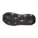 Et nærbillede af sålen på Salomon Ultra Glide 4 W trail-løbesko til kvinder i farvekombinationen Huckle/Black/Redor, der viser den strukturerede overflade og de kantede gummi-knopper, der sikrer godt greb – udviklet med henblik på komfort på lange distancer, set på en hvid baggrund.
