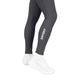 En person iført mørkegrå Saysky W Combat+ Rib Long Tights, Dame, med høj talje og ordet SAYSKY trykt på læggen, kombineret med hvide sportssko. Kun benene og fødderne er synlige på en hvid baggrund.
